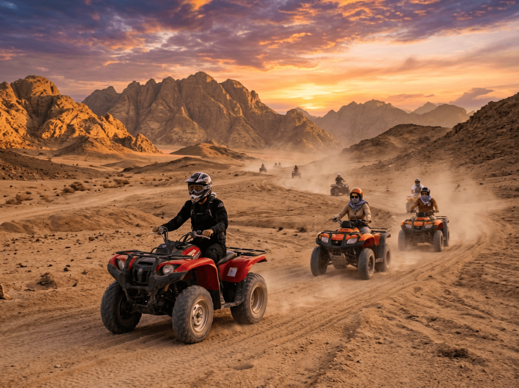 Group of people riding ATVs on dusty desert trail with rocky mountains under colorful sunset sky