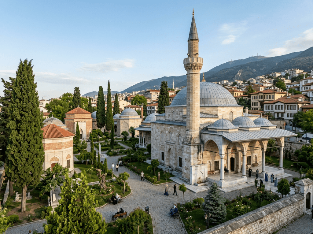 Domed mosque and landscaped courtyard in a historic mountain town